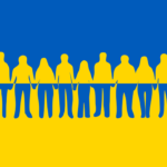 Pracownicy z Ukrainy na tle flagi