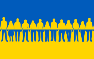 Pracownicy z Ukrainy na tle flagi